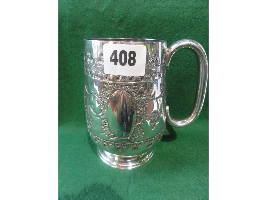 Appraisal: A Victorian silver tankard with a good all over engraving