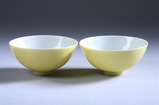 Appraisal: PAIR CHINESE YELLOW PORCELAIN CUPS Yongzheng six-character underglazed blue mark