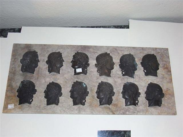 Appraisal: A SET OF TWELVE CAST BRONZE PORTRAIT RELIEF BUSTS of