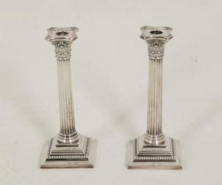 Appraisal: PAIR OF STERLING SILVER RIBBED COLUMN CANDLESTICKS WITH CORINTHIAN CAPITALS