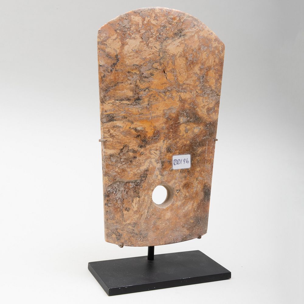 Appraisal: Chinese Carved Jade Axe Head Raised on stand The blade