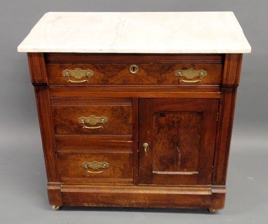 Appraisal: Victorian walnut commode with marble top h x w x