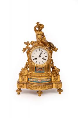 Appraisal: A French gilt metal mounted mantel clock the white enamel