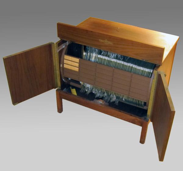 Appraisal: MID CENTURY ''IMMPERIAL MUSIC MINDER'' RECORD CABINET In bench form