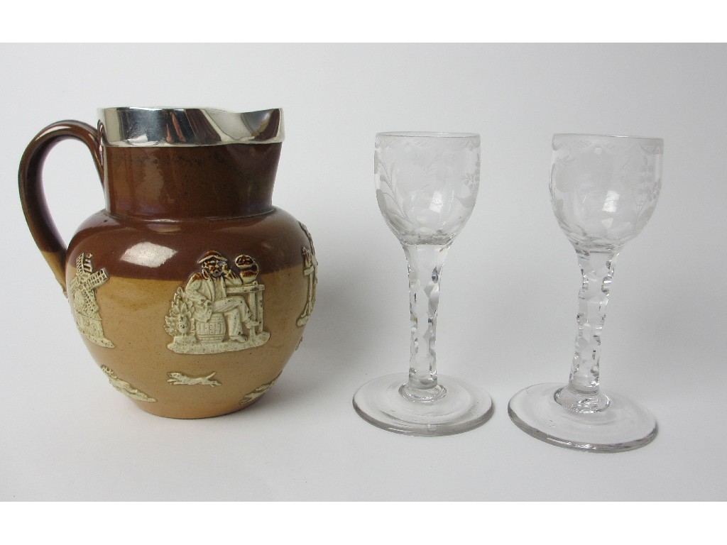 Appraisal: A pair of late th Century wine glasses with etched