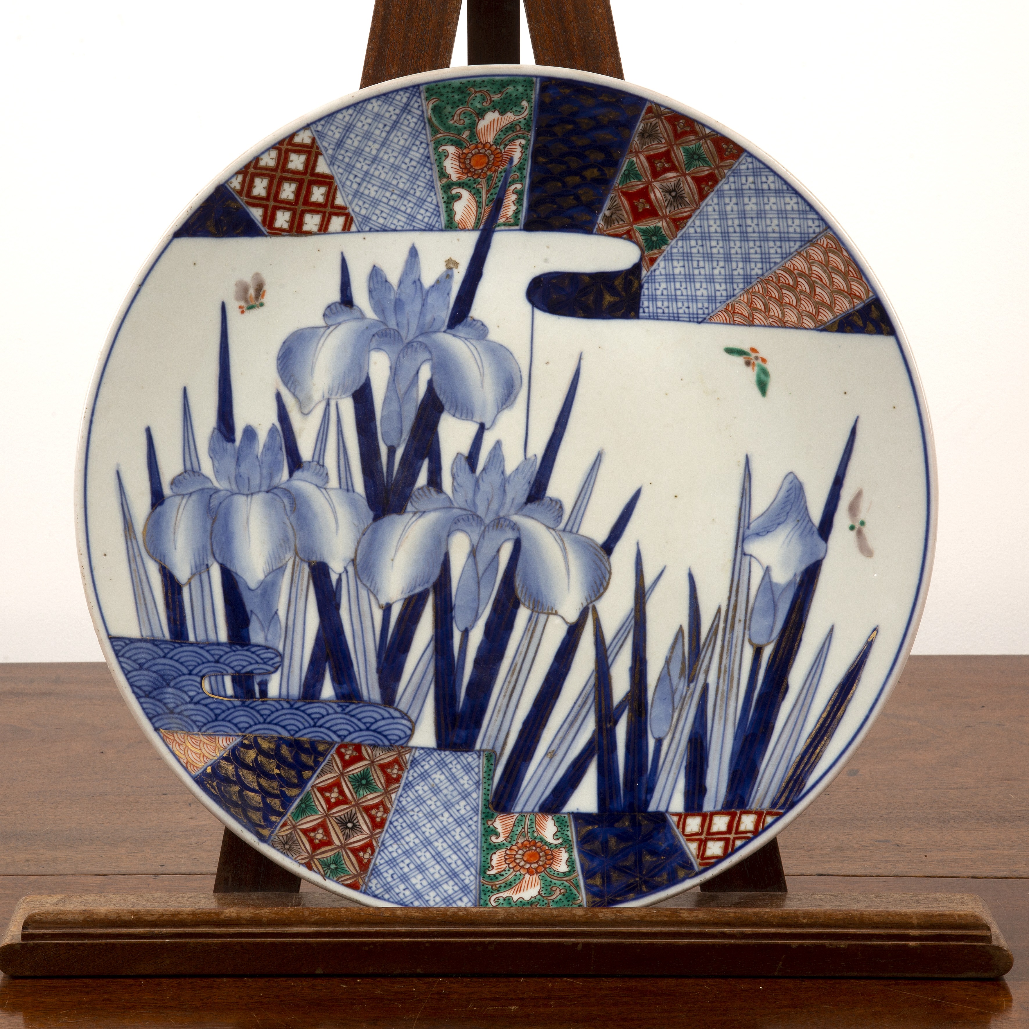 Appraisal: Imari chargerJapanese circa painted with central irises within a brocaded