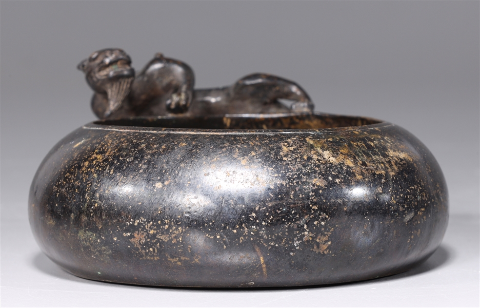 Appraisal: Chinese bronze metal brush washer with animal form to exterior