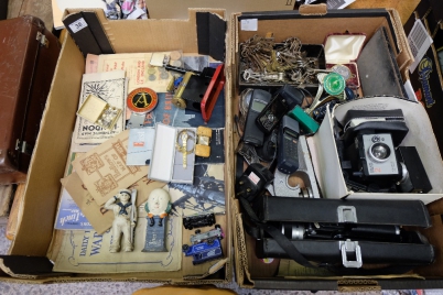 Appraisal: A collection of collectibles and vintage cameras to include cast