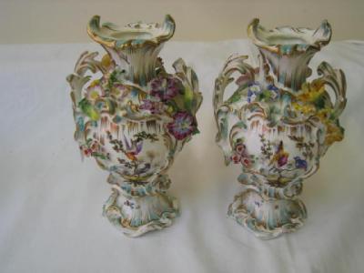 Appraisal: A PAIR OF COALBROOKDALE PORCELAIN VASES of bellied form with