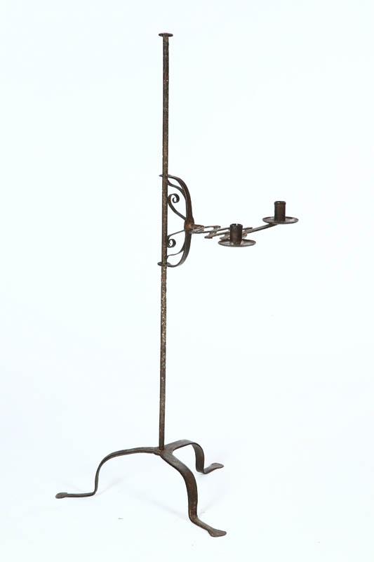 Appraisal: WROUGHT IRON CANDLE STAND American or European th century Tripod