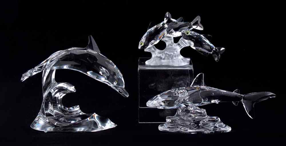 Appraisal: SWAROVSKI CRYSTAL FIGURINES To include DOLPHIN Michael Stamey designer issued