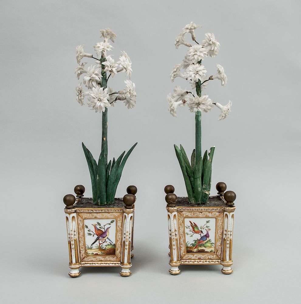 Appraisal: Pair of Paris Porcelain Cachepots Later Fitted with Floral Plants