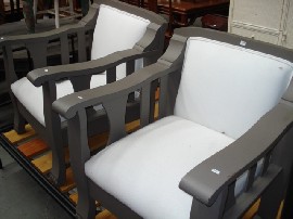 Appraisal: A pair of timber armchairs painted grey with white upholstery