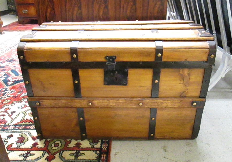 Appraisal: AN OAK AND PINE DOME-TOP TRUNK Continental c of pine