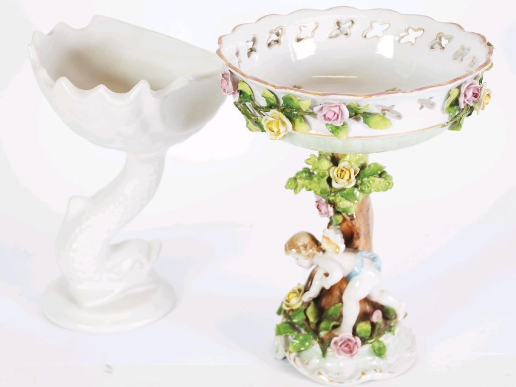 Appraisal: EARLY TWENTIETH CENTURY GERMAN FLORAL ENCRUSTED PORCELAIN TABLE CENTRE FIGURAL