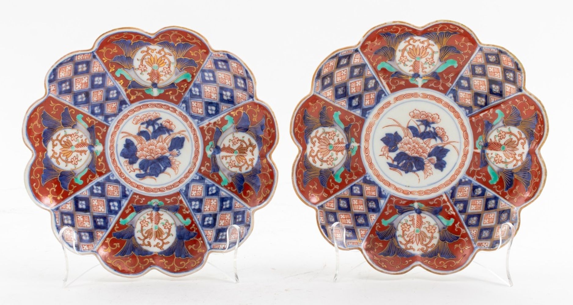 Appraisal: JAPANESE IMARI PORCELAIN FLORIFORM DISHES PAIR Pair of hand-painted Japanese