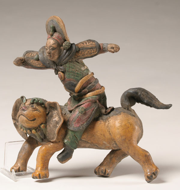 Appraisal: Chinese glazed roof tile ceramic figure mounted on mythical animal