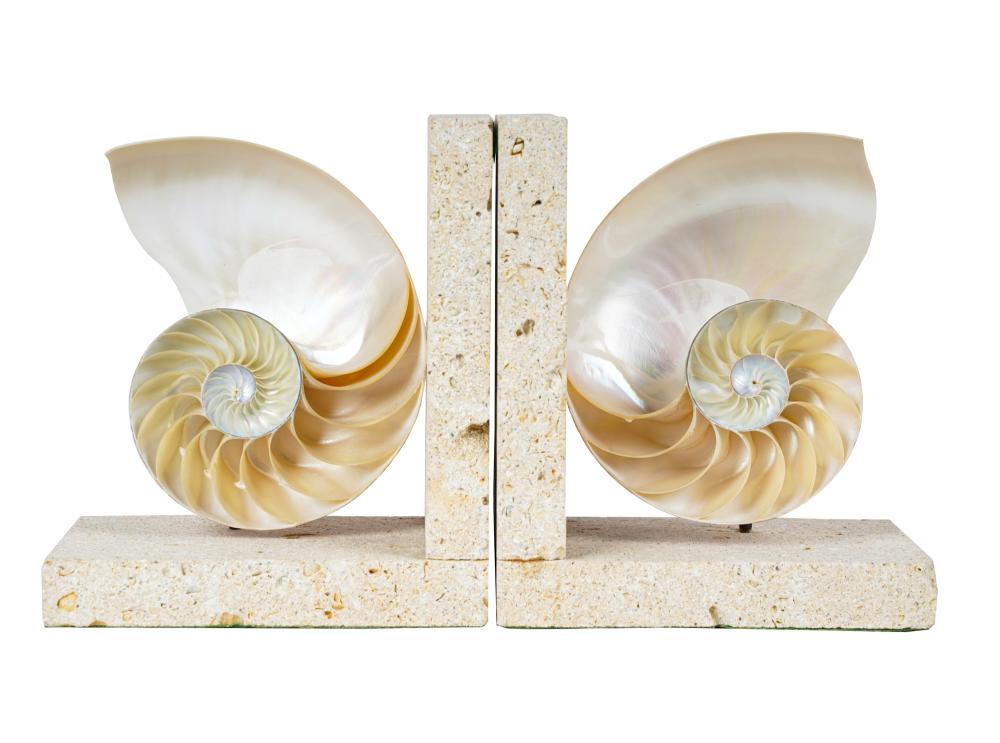 Appraisal: PAIR OF NAUTILUS SPECIMEN BOOKENDSeach of porous stone mounted with