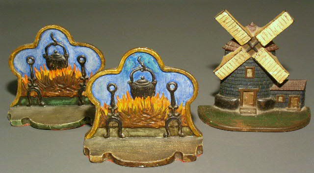 Appraisal: Pair of cast iron fire hearth bookends h x w