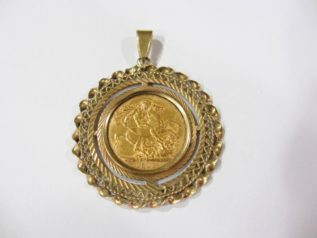 Appraisal: A George V gold sovereign set in a large circular