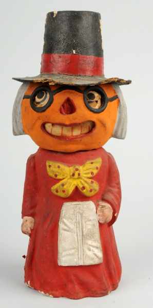 Appraisal: Pumpkin Headed Witch Lantern Candy Container Description Normally found in