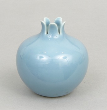 Appraisal: An Antique Blue Glazed Water Pot in Pomegranate Form A