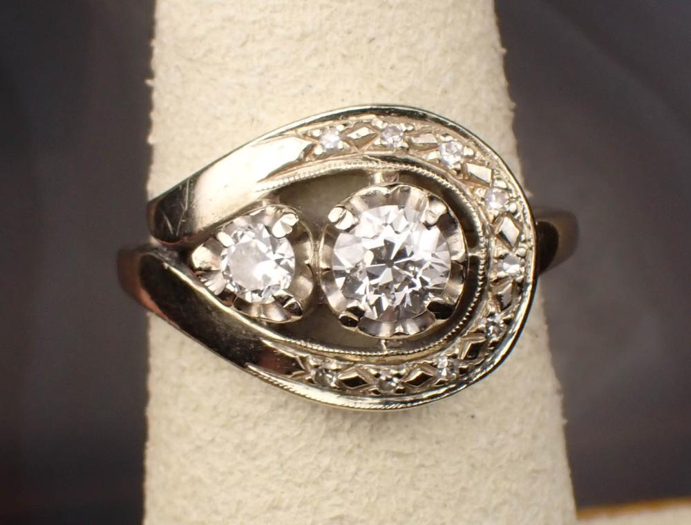 Appraisal: ESTATE DIAMOND AND FOURTEEN KARAT GOLD RING The k white