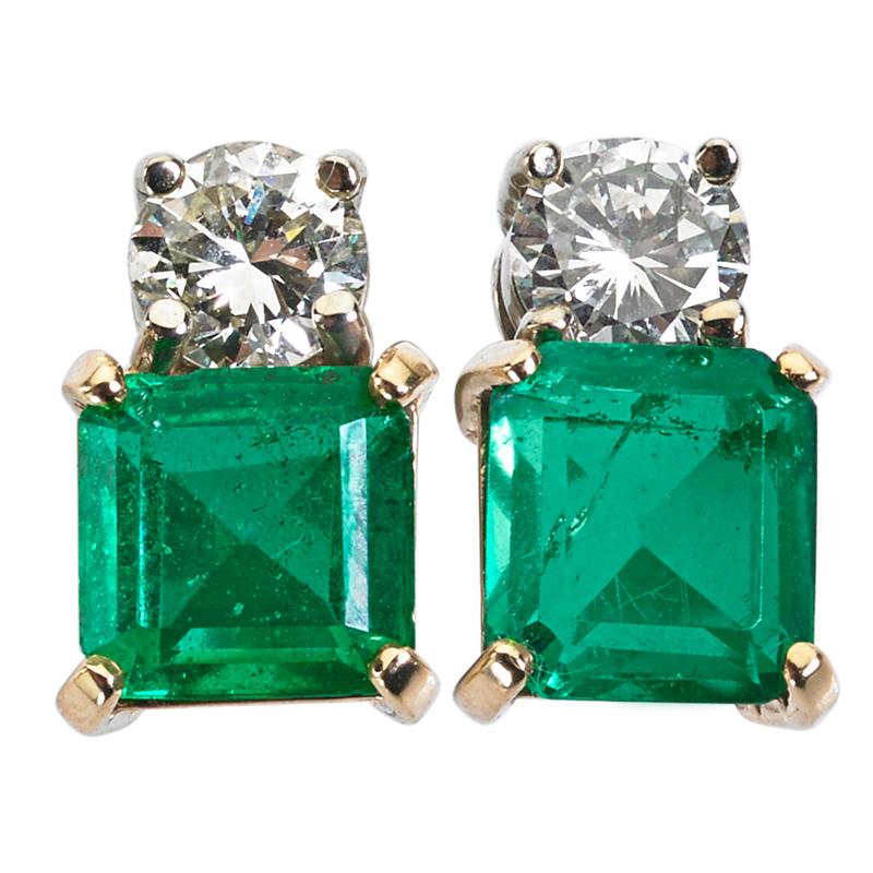 Appraisal: EMERALD AND DIAMOND EARRINGS Classic two stone design Each earring