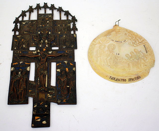 Appraisal: A RUSSIAN BRONZE ENAMELLED ICON depicting Christ crucified surrounded by