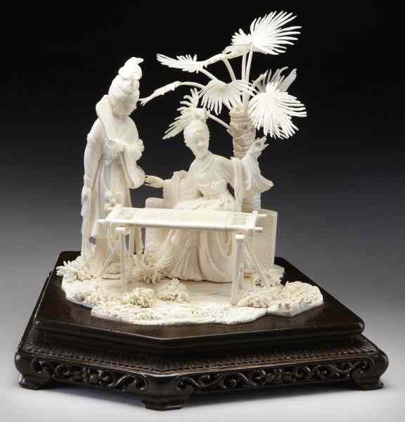 Appraisal: Chinese carved ivory figural group depicting two International buyers should