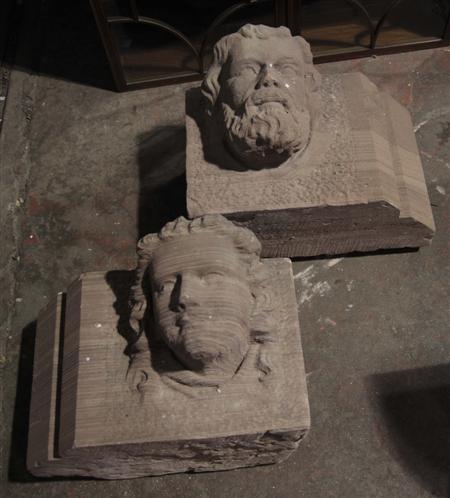 Appraisal: A pair of sandstone carved heads one depicting a bearded