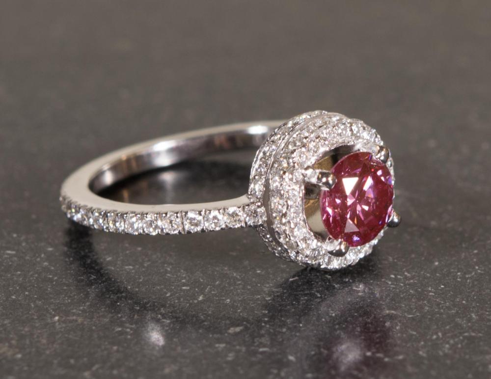 Appraisal: FANCY PINK DIAMOND AND EIGHTEEN KARAT GOLD RING The white