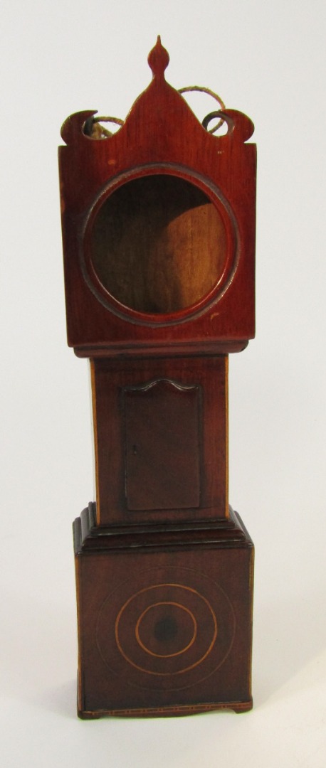 Appraisal: A George III mahogany longcase clock pocket watch holder with