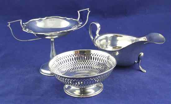 Appraisal: A George V silver sauceboat Viner's Ltd Sheffield together with