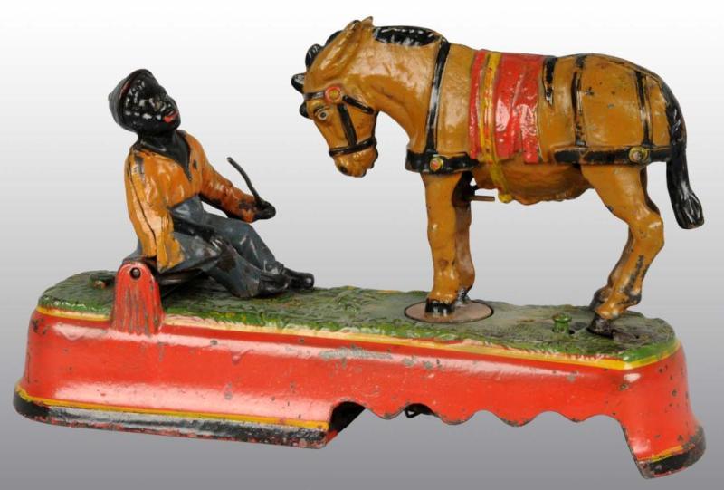 Appraisal: Cast Iron Always Did 'Spise a Mule Mechanical Bank Description