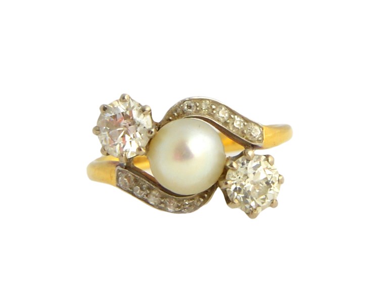 Appraisal: A gold diamond and cultured pearl ring mounted with the