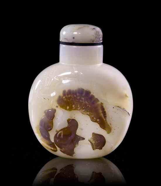 Appraisal: A Shadow Agate Snuff Bottle of white stone depicting a