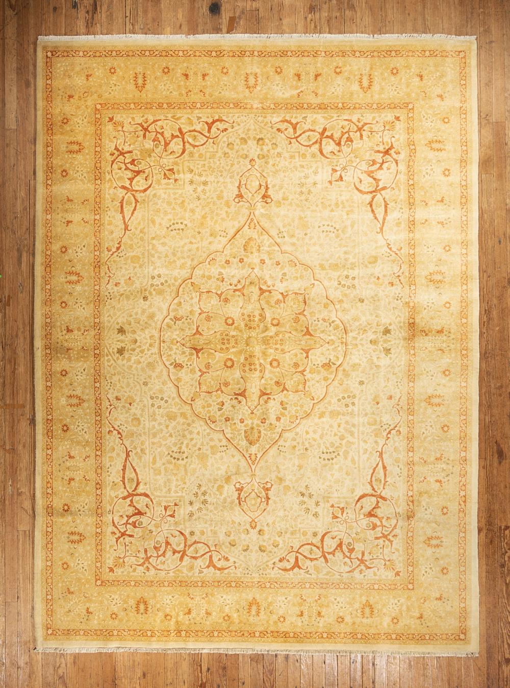 Appraisal: Oushak Carpet sand ground floral designs in rust and olive