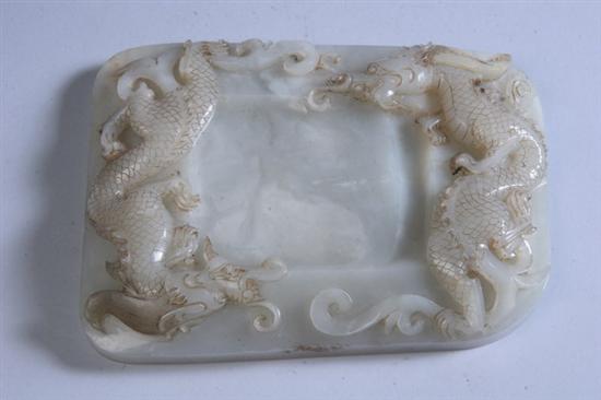 Appraisal: CHINESE WHITE JADE INKSTONE Early th century Carved with two