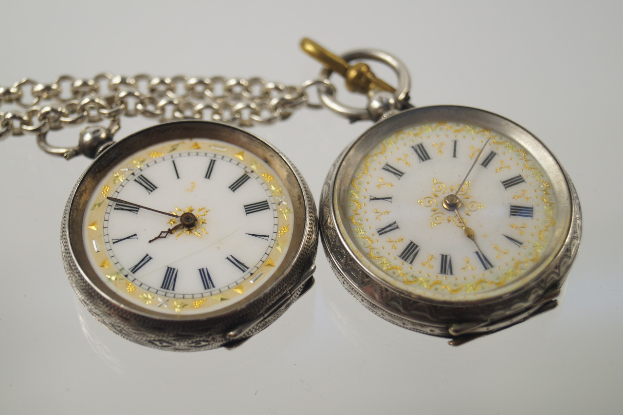 Appraisal: A Continental silver fob watch with white dial and Roman