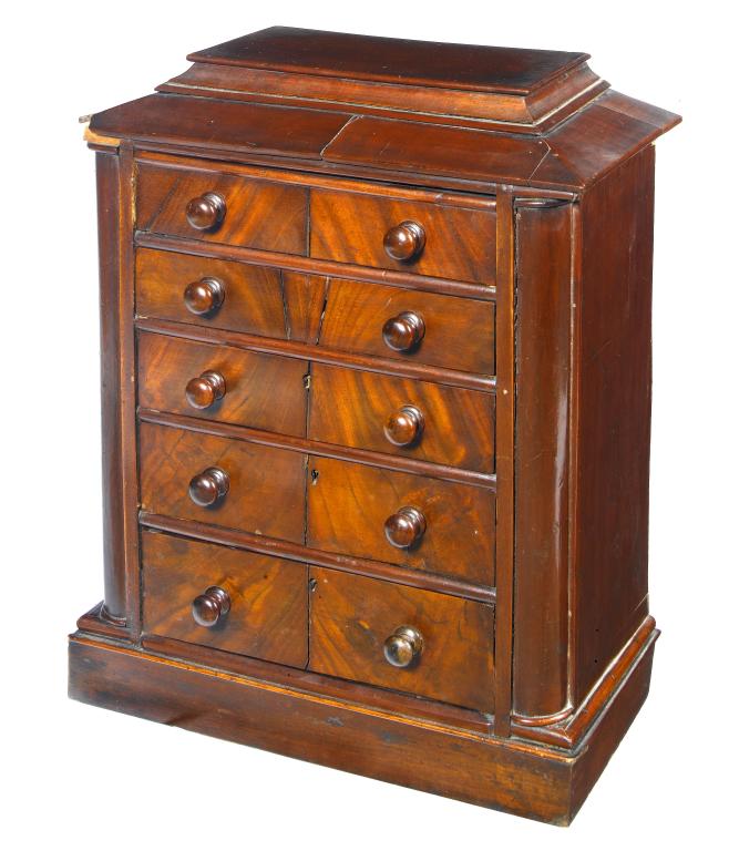 Appraisal: A NORTHERN EUROPEAN MAHOGANY MINIATURE CHEST OF DRAWERS with stepped