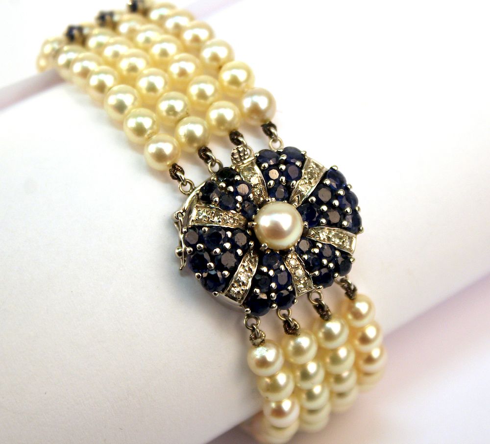 Appraisal: K Gold Diamonds Sapphires Pearls Bracelet K white gold diamonds