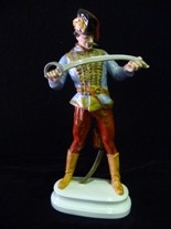 Appraisal: A Herend figure of a Hussar in traditional dress holding