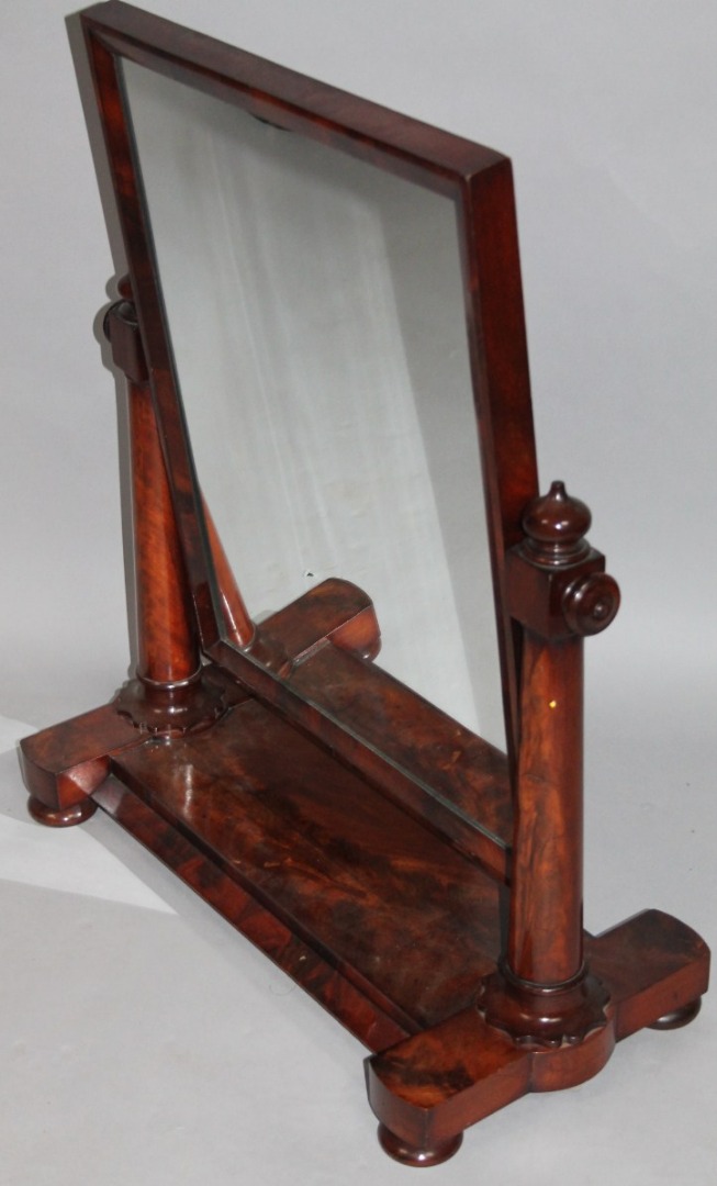 Appraisal: A Victorian flame mahogany table mirror of large proportion the