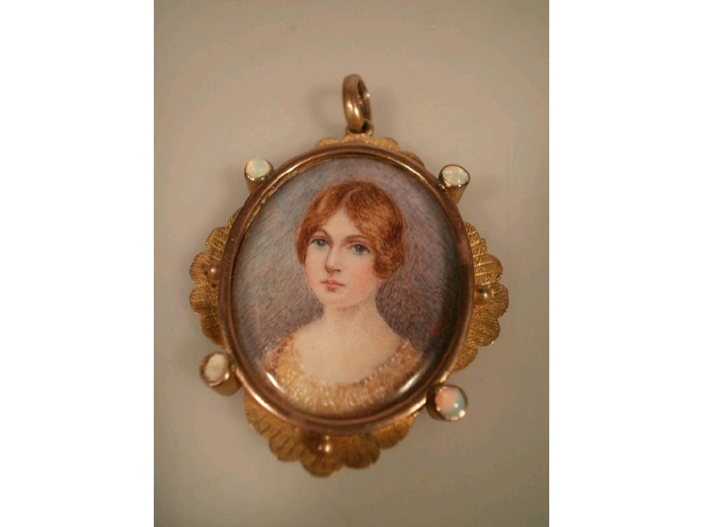 Appraisal: A Victorian double sided pendant possibly Australian with portrait miniatures