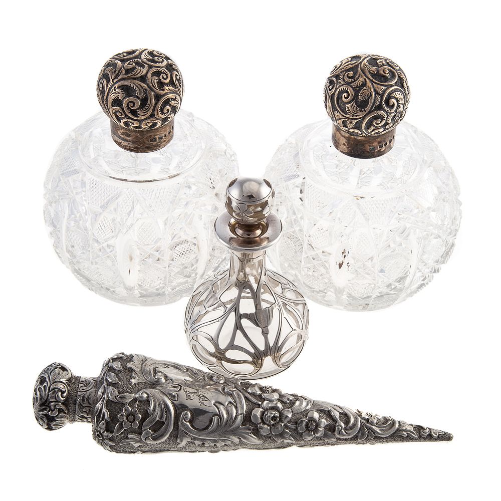 Appraisal: Four Sterling-Mounted Dressing Articles Including a pair of Victorian crystal