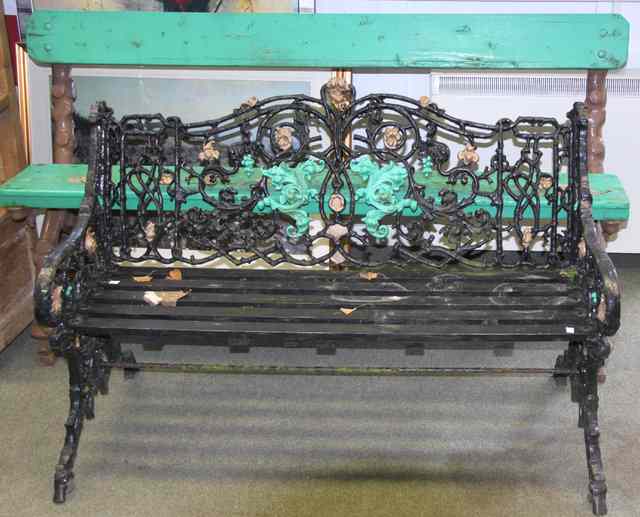 Appraisal: A cast iron garden bench with wooden slatted seat and