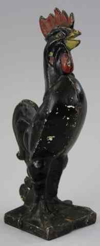 Appraisal: ROOSTER DOORSTOP Full figure casting standing pose painted in black