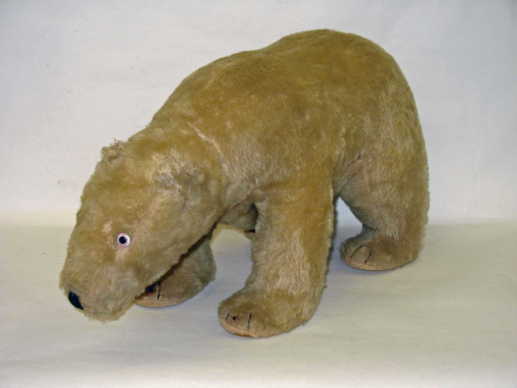 Appraisal: A cream plush polar bear toy with jointed head and