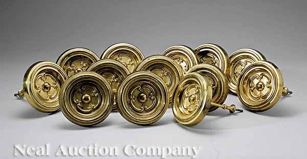 Appraisal: A Set of Thirteen Large American Gilt and Pressed Brass